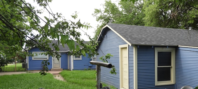 exterior space with a yard