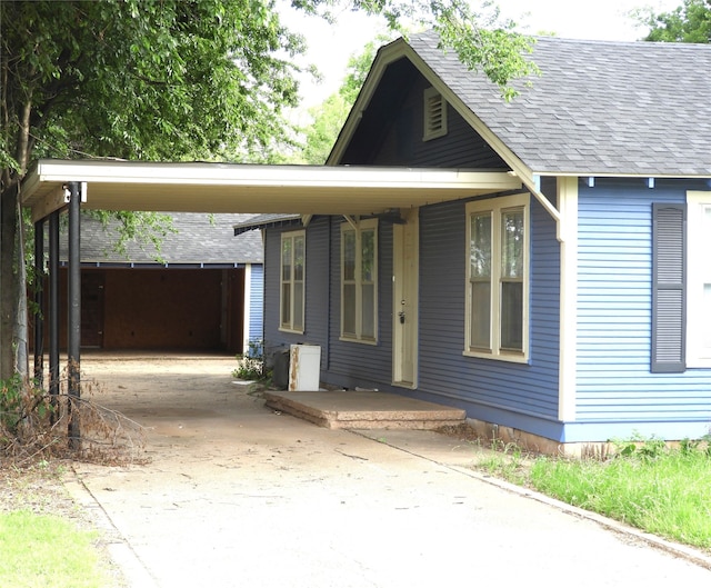 view of front of house featuring a carport