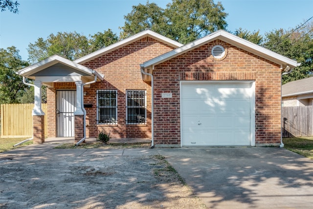 view of front of property featuring a garage