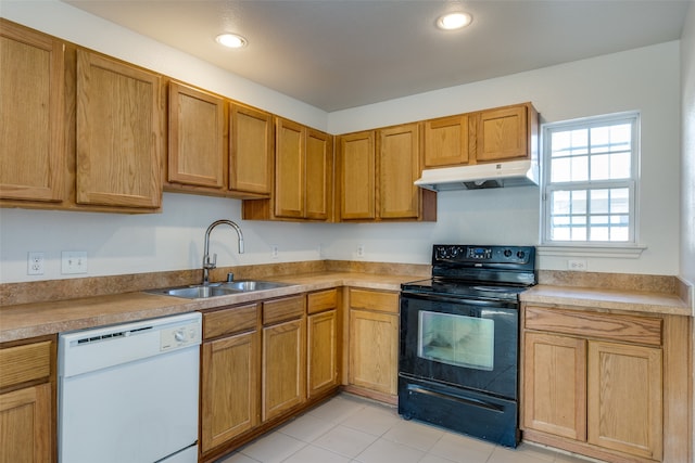 kitchen featuring black / electric stove, white dishwasher, sink, and light tile patterned floors