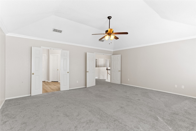 unfurnished bedroom with lofted ceiling, light colored carpet, and ceiling fan