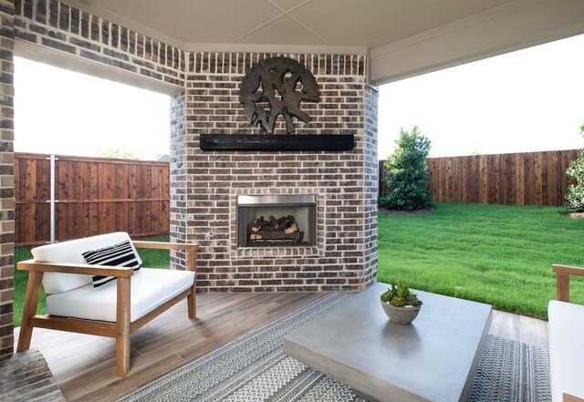 4127 Olmsted Dr, Rockwall, TX 75032 - deck featuring a yard and an outdoor brick fireplace
