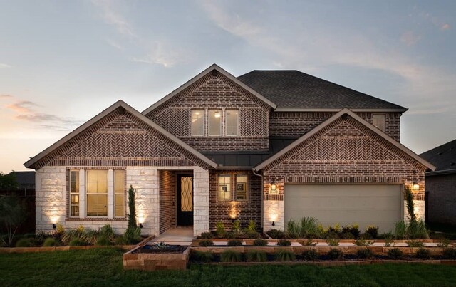 4127 Olmsted Dr, Rockwall, TX 75032 - view of front of house featuring a garage and a lawn