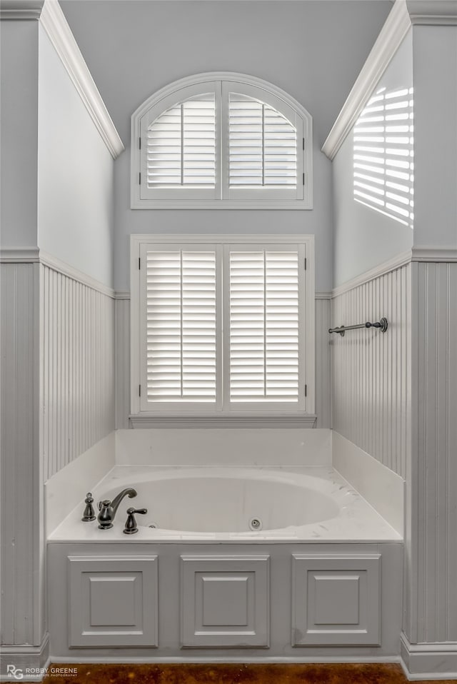 bathroom with a tub to relax in