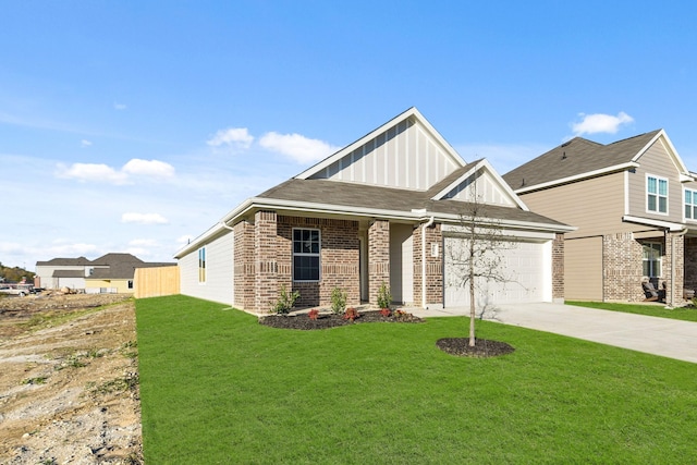 craftsman house featuring a garage and a front yard