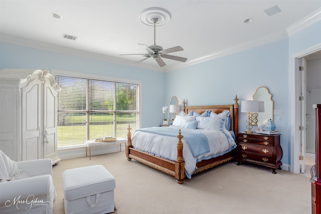 bedroom with ornamental molding, carpet flooring, and ceiling fan