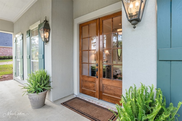 property entrance with french doors and covered porch