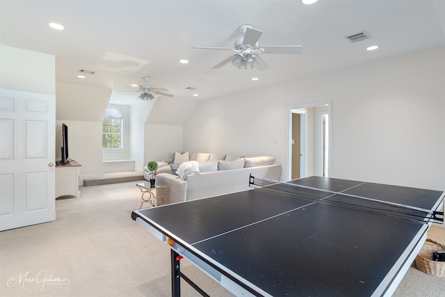 game room with light carpet, ceiling fan, and vaulted ceiling