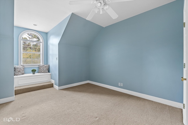 bonus room with ceiling fan, carpet, and vaulted ceiling