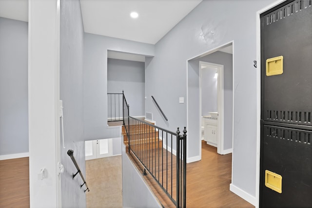 hall featuring light hardwood / wood-style floors