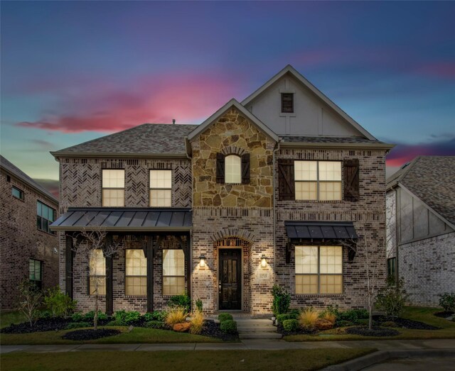 view of front of home featuring a front lawn