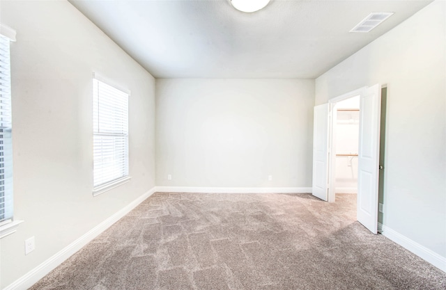 view of carpeted spare room