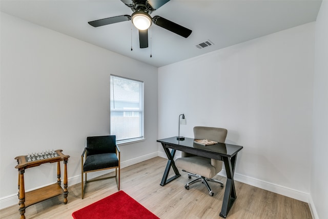 office area with ceiling fan and light hardwood / wood-style flooring