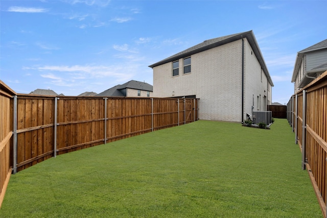 view of yard featuring central AC