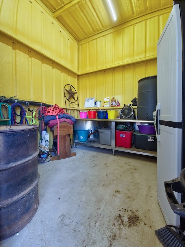 garage featuring white fridge