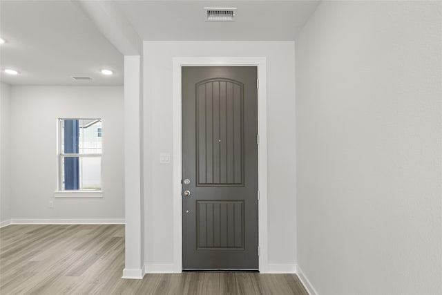 entrance foyer with light hardwood / wood-style floors