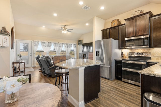 kitchen with plenty of natural light, visible vents, appliances with stainless steel finishes, and open floor plan