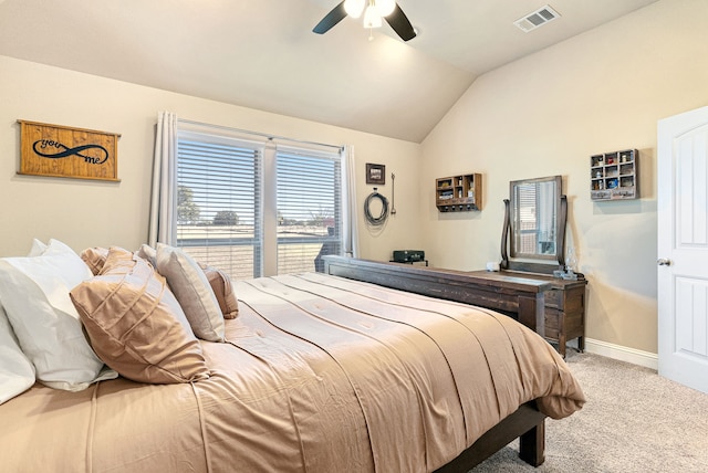 bedroom featuring carpet, visible vents, a ceiling fan, vaulted ceiling, and baseboards