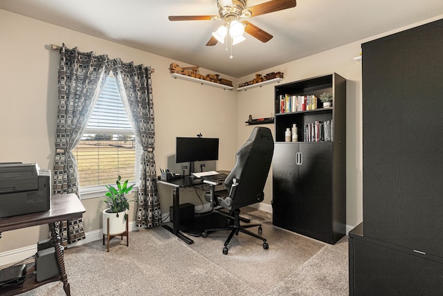 carpeted office with ceiling fan