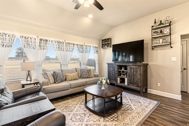 living room featuring ceiling fan, a healthy amount of sunlight, lofted ceiling, and hardwood / wood-style floors