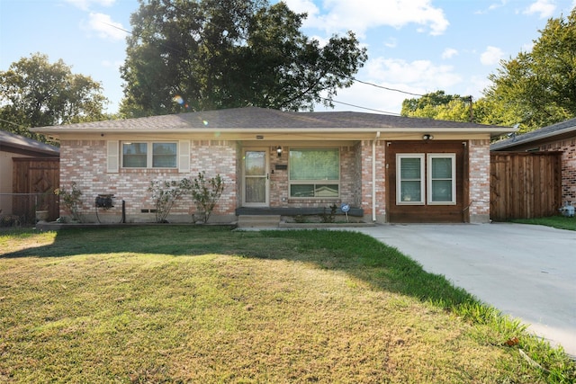 ranch-style house with a front lawn