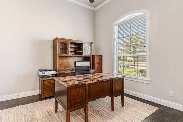 office area with a wealth of natural light, ornamental molding, and hardwood / wood-style floors