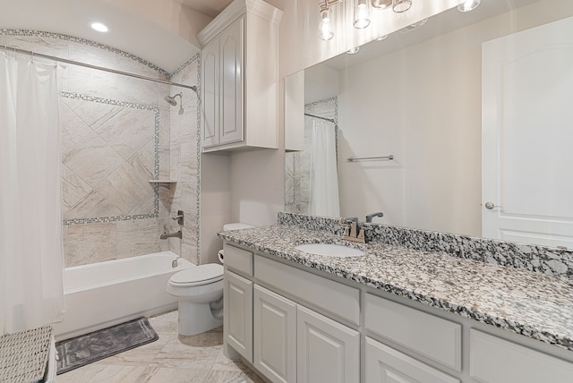 full bathroom with toilet, vanity, and shower / tub combo