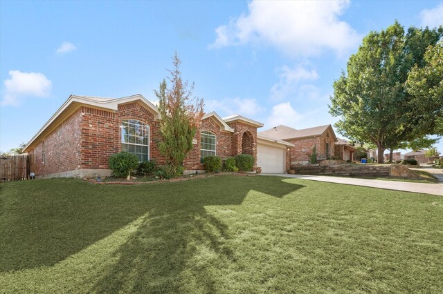 back of house with a patio area and a yard