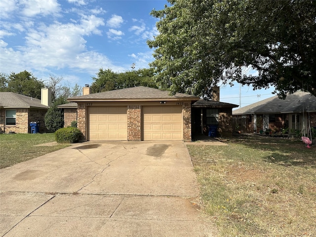 exterior space featuring a yard and a garage