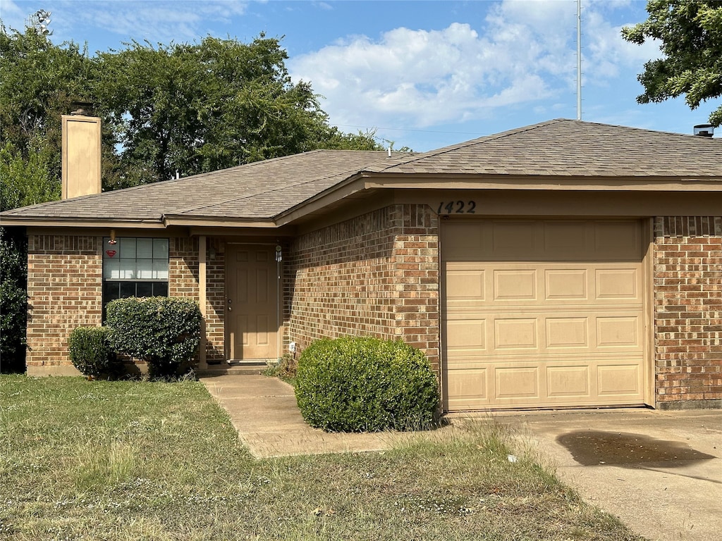 ranch-style house with a garage