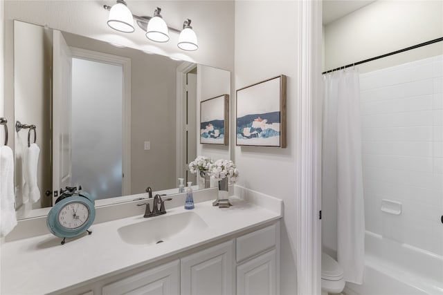 full bathroom featuring vanity, toilet, and shower / tub combo with curtain