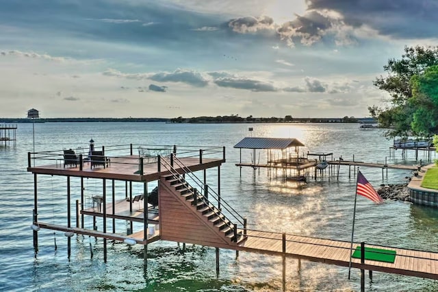 dock area with a water view