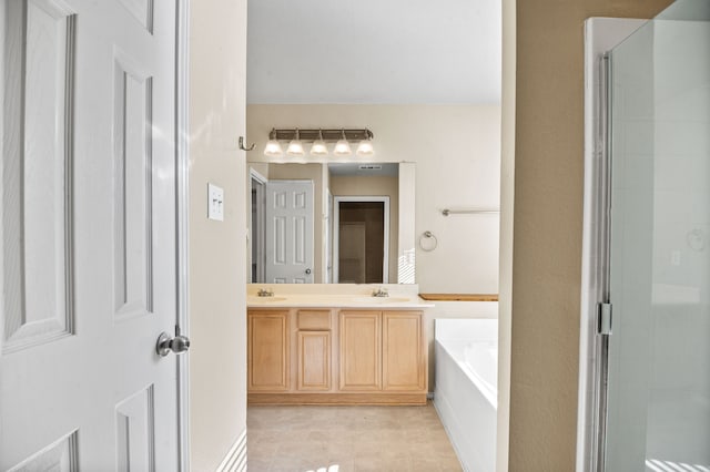 bathroom featuring vanity and plus walk in shower