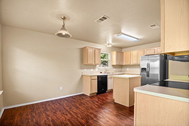 kitchen with light brown cabinetry, dark hardwood / wood-style floors, black appliances, and a kitchen island