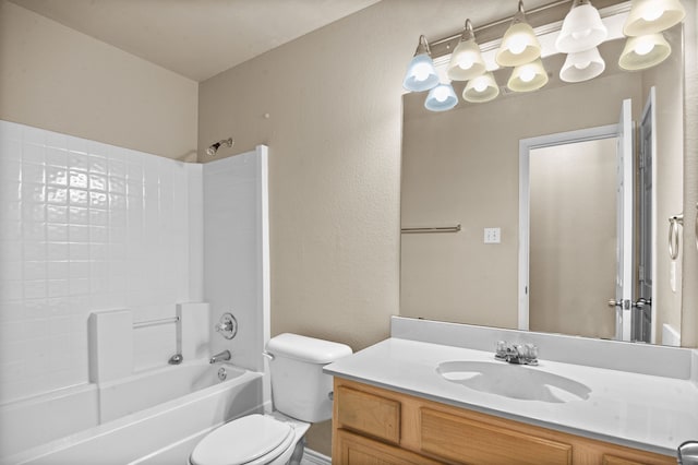 full bathroom featuring vanity, toilet, and tub / shower combination