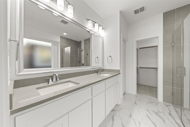 bathroom featuring vanity and walk in shower