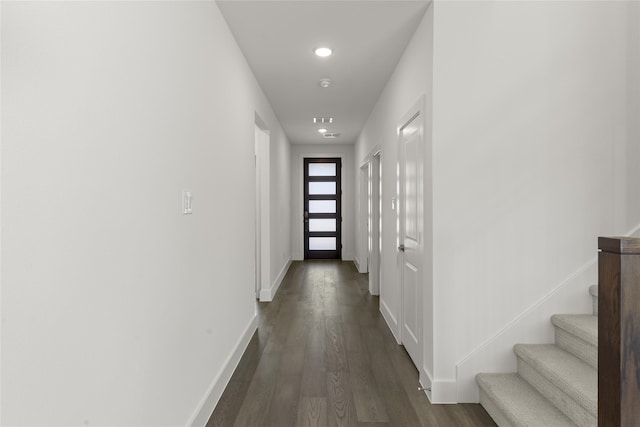 8108 Caprock Trl, Rowlett, TX 75089 - hallway with dark wood-style flooring and stairway