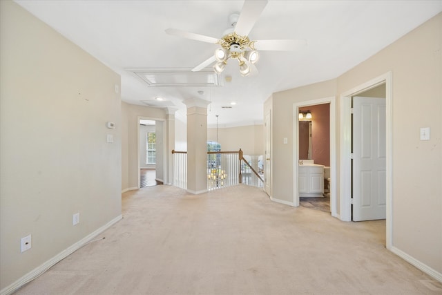 unfurnished room with light carpet and ceiling fan