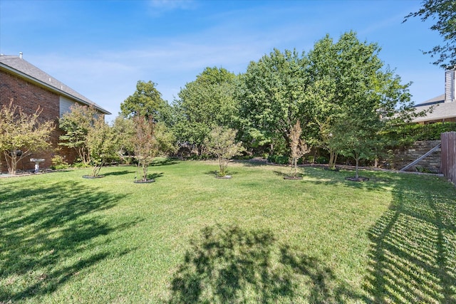 view of yard with fence