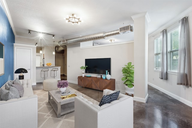 living room with ornamental molding, concrete flooring, and a textured ceiling