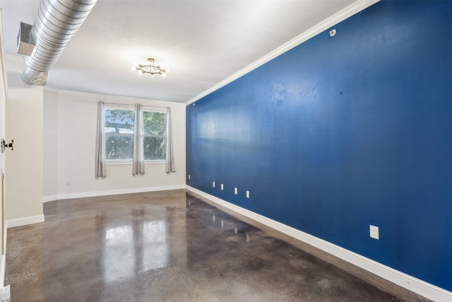 unfurnished room with ornamental molding, a textured ceiling, and concrete flooring