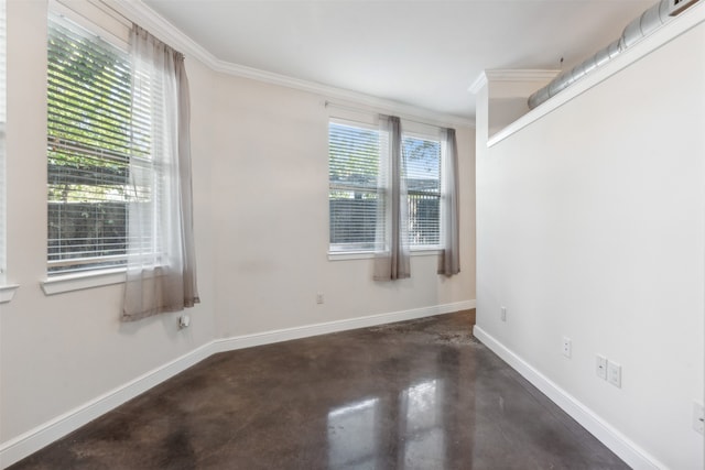 spare room with crown molding