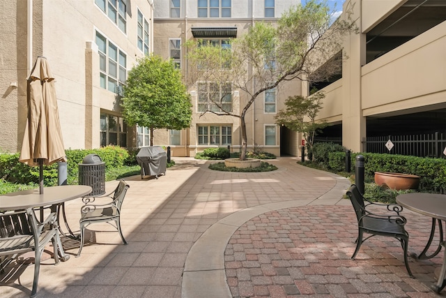 view of property's community featuring a patio