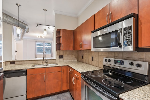 kitchen featuring sink, kitchen peninsula, stainless steel appliances, decorative light fixtures, and crown molding