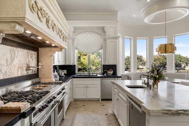 kitchen with custom exhaust hood, stainless steel appliances, and plenty of natural light