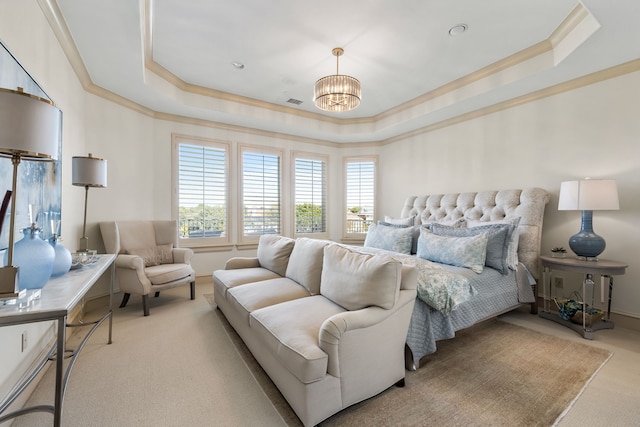 carpeted bedroom with crown molding, a notable chandelier, and a tray ceiling