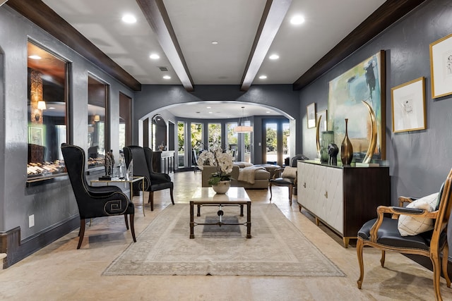 interior space featuring beamed ceiling