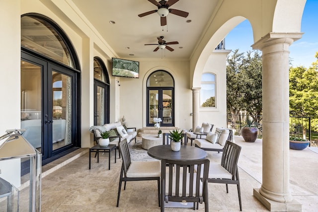 view of patio / terrace featuring french doors, an outdoor living space, and ceiling fan