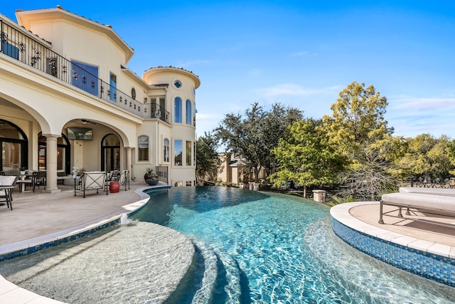 view of pool with a patio area