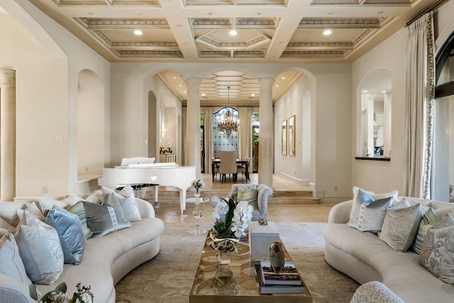 living room with a notable chandelier, ornamental molding, beamed ceiling, and coffered ceiling